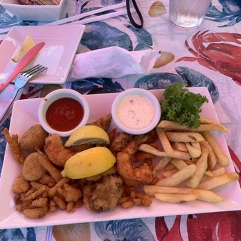 The Fish House - Fried Combo: Catch of the day, shrimp, scallops, oysters and clam strips - Seafood Near Me - Key Largo, Florida The Fish House - Fried Combo: Catch of the day, shrimp, scallops, oysters and clam strips - Seafood Near Me - Key Largo, Florida