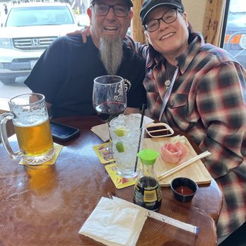 Lake Arrowhead Sports Grille - Happy customers with drinks and sushi. - Sports Bars Near Me - Blue Jay, California Lake Arrowhead Sports Grille - Happy customers with drinks and sushi. - Sports Bars Near Me - Blue Jay, California
