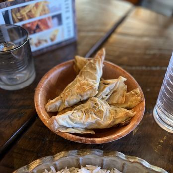 Olive & Lamb - two plates of food on a table - Mediterranean Near Me - Minneapolis, Minnesota Olive & Lamb - two plates of food on a table - Mediterranean Near Me - Minneapolis, Minnesota