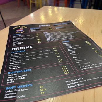 Pinata Tacos - a menu on a table - Mexican Near Me - Toronto, Ontario