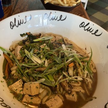 The Cafe - Udon noodle bowl with tofu. Truffle fries in the background. - Sandwiches Near Me - Key West, Florida The Cafe - Udon noodle bowl with tofu. Truffle fries in the background. - Sandwiches Near Me - Key West, Florida