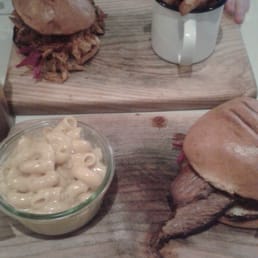 Pulled Pork sandwich with fries, Brisket sandwich with mac and cheese.