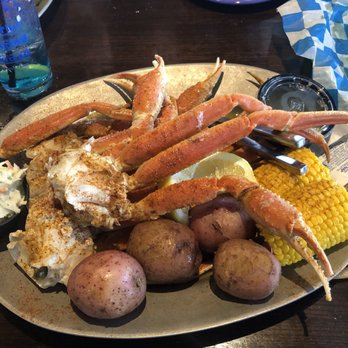 Tailfins Waterfront Grill - The snow crab is on another level. My husband finished this plate in about 10 minutes because it was that good. - Seafood Near Me - Destin, Florida Tailfins Waterfront Grill - The snow crab is on another level. My husband finished this plate in about 10 minutes because it was that good. - Seafood Near Me - Destin, Florida