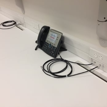 Precision Voice & Data Solutions - Voip phone at work station - Telecommunications Near Me