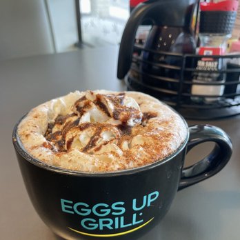Eggs Up Grill - Hot Cocoa with whipped cream and chocolate drizzle. - Breakfast & Brunch Near Me - Apopka, Florida Eggs Up Grill - Hot Cocoa with whipped cream and chocolate drizzle. - Breakfast & Brunch Near Me - Apopka, Florida