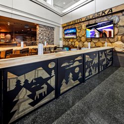Our bar seating facing the C Concourse is adorned with our signature design.
