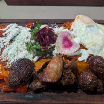 Santo Remedio - Chilaquiles trio with caritas and fried eggs - Mexican Near Me - Orange, California