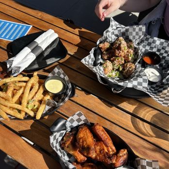 The Elbow Room - Bone in buffalo wings truffle fries boneless lemon pepper wings - American Near Me - Brookfield, Wisconsin