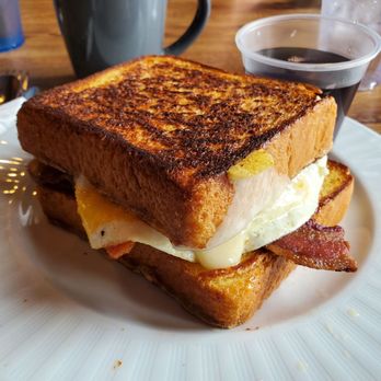 Our Place - French Toast Sandwich with bacon, egg and Swiss cheese - Comfort Food Near Me - Brook, Indiana