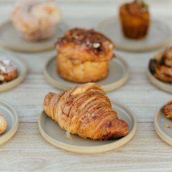 Communal - a variety of pastries on plates - Coffee & Tea Near Me - San Diego, California Communal - a variety of pastries on plates - Coffee & Tea Near Me - San Diego, California