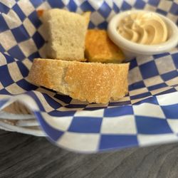 Inferno's Bistro - 3 types of bread; baguette, focaccia and cornbread with very delicious compound butters. You'll wish there was more of the bread!