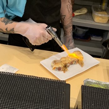 Master Joe's - a chef cutting a sandwich - Sushi Bars Near Me - Fairhope, Alabama Master Joe's - a chef cutting a sandwich - Sushi Bars Near Me - Fairhope, Alabama