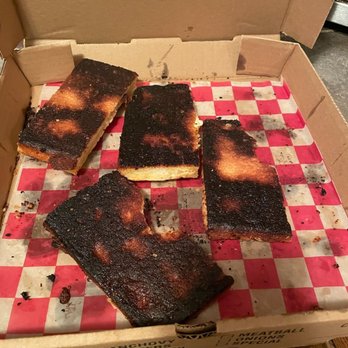 Marianacci's Restaurant - a box of burnt pizza - Pizza Near Me - Wyoming, Pennsylvania Marianacci's Restaurant - a box of burnt pizza - Pizza Near Me - Wyoming, Pennsylvania