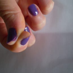 See the nailpolish slopped on my thumb. Bad manicure! See the nailpolish slopped on my thumb. Bad manicure!