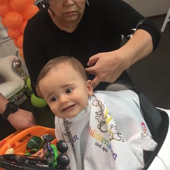 Childrensalon and spa - Santi getting his first haircut - Kids Hair Salons Near Me - Miami, Florida Childrensalon and spa - Santi getting his first haircut - Kids Hair Salons Near Me - Miami, Florida