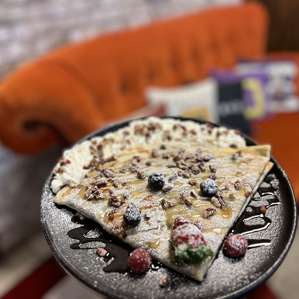 Baldwin Perk - a slice of pizza on a plate - Cafes Near Me - Orlando, Florida Baldwin Perk - a slice of pizza on a plate - Cafes Near Me - Orlando, Florida