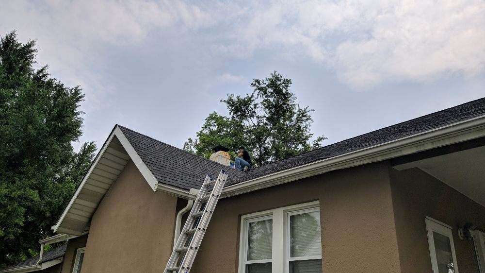 Slide of Precision Roofing