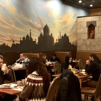Bombay Garden - a group of people eating at a restaurant - Indian Near Me - West Jordan, Utah