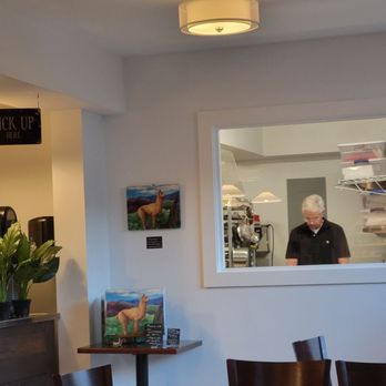 Mystic River Chocolate Cafe - Hard at work making the chocolate - Chocolatiers & Shops Near Me - Mystic, Connecticut
