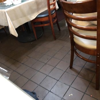 Florida Restaurant - Look at the floor. These tables have been dirty for 25 minutes atleast. - Cuban Near Me - Downey, California Florida Restaurant - Look at the floor. These tables have been dirty for 25 minutes atleast. - Cuban Near Me - Downey, California