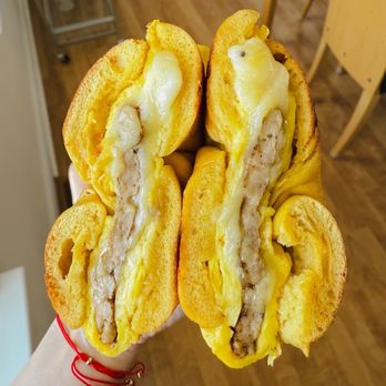 Utopia Bagels - Build Your Own Sandwich: sausage, egg, cheese on a buttered, scooped out egg bagel - Bagels Near Me - New York, New York