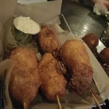 The Midway Pub - Corn dogs with honey mustardy dipping sauce - Pubs Near Me - Atlanta, Georgia The Midway Pub - Corn dogs with honey mustardy dipping sauce - Pubs Near Me - Atlanta, Georgia