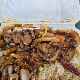 Sapost to be Mongolian beef. Never seen it before with red sauce. Sapost to be Mongolian beef. Never seen it before with red sauce.