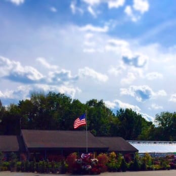 Spillane's Nursery - an american flag flying in the wind - Nurseries & Gardening Near Me - Middleborough, Massachusetts