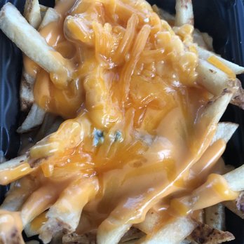 Wendy's - cheesy fries in a plastic container - Fast Food Near Me - Williamsburg, Virginia Wendy's - cheesy fries in a plastic container - Fast Food Near Me - Williamsburg, Virginia