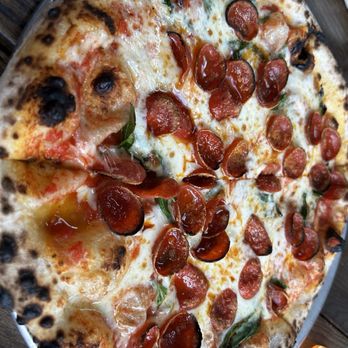 Rosalia Pizza Linden Hills - Pepperoni pizza with basil added on - Pizza Near Me - Minneapolis, Minnesota