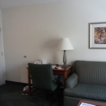 Sonesta ES Suites - Large, clean comfy couch and side chair with side tables, lovely pics in room. - Hotels Near Me - Flagstaff, Arizona Sonesta ES Suites - Large, clean comfy couch and side chair with side tables, lovely pics in room. - Hotels Near Me - Flagstaff, Arizona