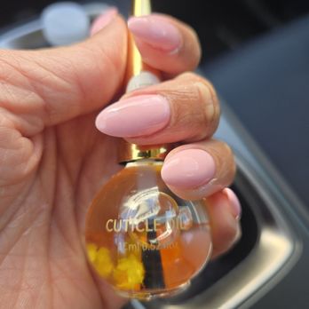 Aura Nail Bar - Dip (nail artist's color choice) on my natural nails (no artificial tips). Skinny almond (shape) and complimentary cuticle oil. - Nail Salons Near Me - Forney, Texas