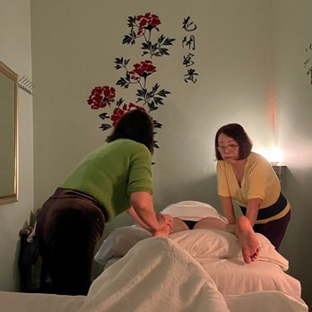 CoCo Massage - Massage therapists massaging a client. - Massage Therapy Near Me - Selbyville, Delaware