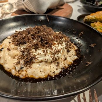 THE CHASTAIN - Black Truffle Risotto. $32. Red wine and black truffle jus, Green Hill mousse, smoked potato skin. - Diners Near Me - Atlanta, Georgia THE CHASTAIN - Black Truffle Risotto. $32. Red wine and black truffle jus, Green Hill mousse, smoked potato skin. - Diners Near Me - Atlanta, Georgia