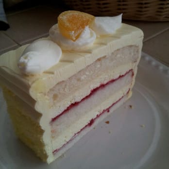 Tasteful Cakes - Corona Sunset cake. Lemon buttercream with raspberry between layers. - Desserts Near Me - Corona, California Tasteful Cakes - Corona Sunset cake. Lemon buttercream with raspberry between layers. - Desserts Near Me - Corona, California