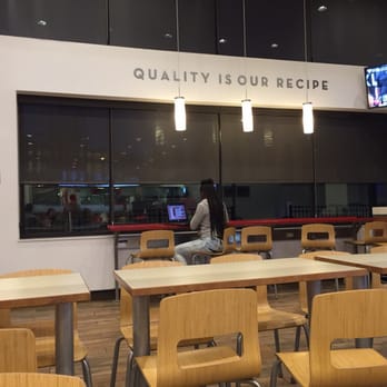 Wendy's - a woman sitting at a table in a restaurant - Fast Food Near Me - Pittsburgh, Pennsylvania Wendy's - a woman sitting at a table in a restaurant - Fast Food Near Me - Pittsburgh, Pennsylvania