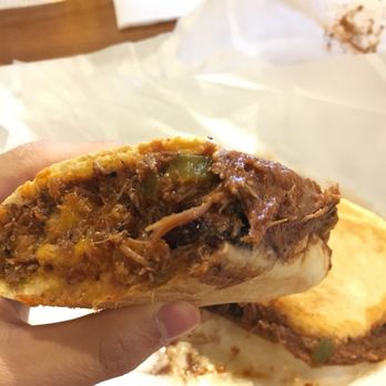 Cafecito - The inside of a Ropa Vieja sandwich - Coffee & Tea Near Me - Chicago, Illinois Cafecito - The inside of a Ropa Vieja sandwich - Coffee & Tea Near Me - Chicago, Illinois