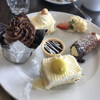 Dockside - Desserts from the brunch buffet, coconut cake so good! The Florentine (rolled thing) fantastic!!! - Salad Near Me - Coeur D Alene, Idaho Dockside - Desserts from the brunch buffet, coconut cake so good! The Florentine (rolled thing) fantastic!!! - Salad Near Me - Coeur D Alene, Idaho