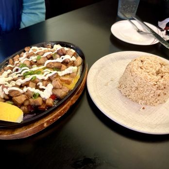 Tita Flora's - Pork Sisig - Pork with Garlic Fried Rice - Breakfast & Brunch Near Me - Independence, Ohio Tita Flora's - Pork Sisig - Pork with Garlic Fried Rice - Breakfast & Brunch Near Me - Independence, Ohio