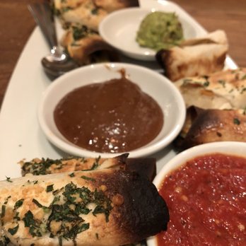 California Pizza Kitchen - Burnt appetizer. Tasted like a frozen pizza roll that you burnt in the oven at home.. - Pizza Near Me - Troy, Michigan California Pizza Kitchen - Burnt appetizer. Tasted like a frozen pizza roll that you burnt in the oven at home.. - Pizza Near Me - Troy, Michigan