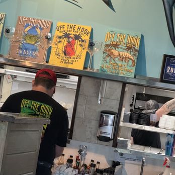 Off The Hook Raw Bar and Grill - View of the kitchen window - Seafood Near Me - New Smyrna Beach, Florida