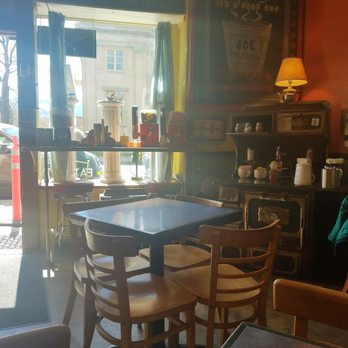 Coffee Crossing - Cozy indoor & outside seating. Vintage condiment area. - Coffee & Tea Near Me - Livingston, Montana Coffee Crossing - Cozy indoor & outside seating. Vintage condiment area. - Coffee & Tea Near Me - Livingston, Montana