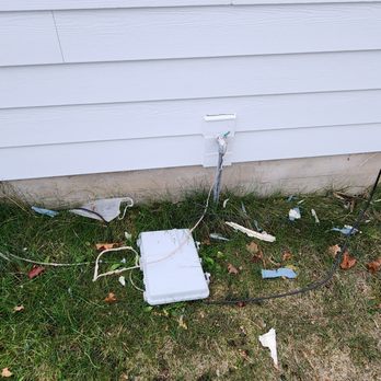 DaBella - Cable box left on the ground along with paint chip from old siding. - Roofing Near Me - Spokane Valley, Washington