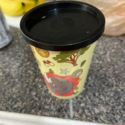 Sip cup. No straws, impossible to drink from.