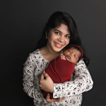Amy Doak Photography - newborn photoshoot baby girl with aunt - Session Photography Near Me - Buffalo, New York