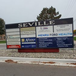 Henry Ford Macomb Cardiac Rehabilitation - Seville - Seville Business Sign with many medical practices listed for info and guidance. Thursday 10/5/2023