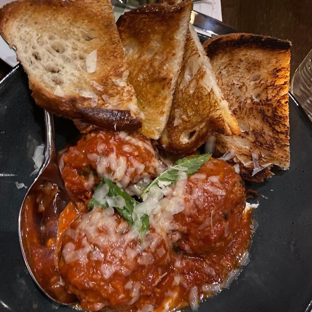 Mio Modo - a plate of food on a table - Italian Near Me - St. Charles, Illinois Mio Modo - a plate of food on a table - Italian Near Me - St. Charles, Illinois