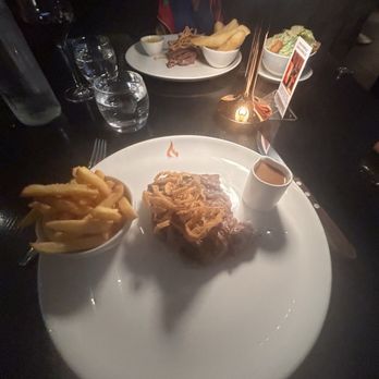 FIRE Steakhouse & Bar - Ribeye and thin fried - sirloin with thick fires and Caesar salad. - Brasseries Near Me - Dublin, D