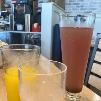 Jam + Toast - "It's Not You, It's Me" lemonade/blueberry/generous on the champagne + Freshly Squeezed OJ (machine to squeeze in background) - Breakfast & Brunch Near Me - Frisco, Texas Jam + Toast - "It's Not You, It's Me" lemonade/blueberry/generous on the champagne + Freshly Squeezed OJ (machine to squeeze in background) - Breakfast & Brunch Near Me - Frisco, Texas