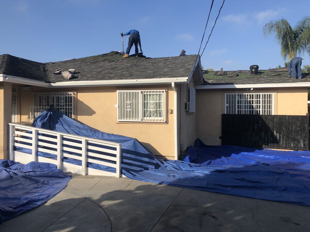 Slide of Economy Roofing & Construction